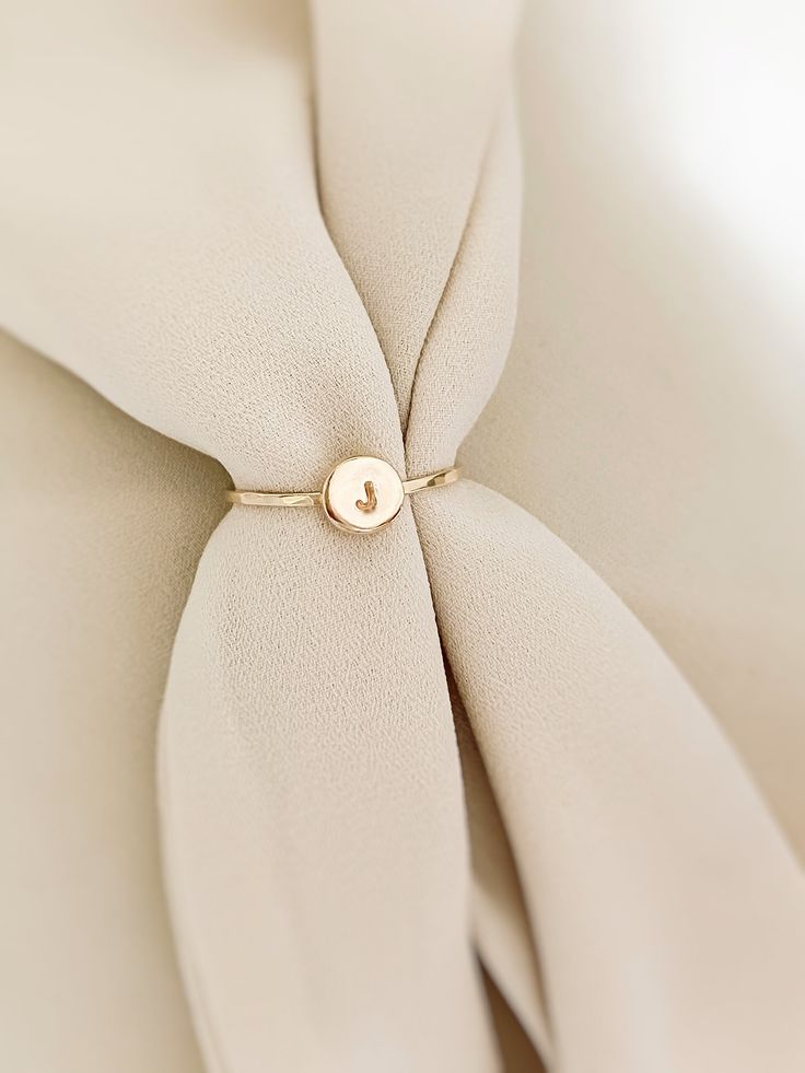 The beautiful initial ring with your birthstone, it's a stunning set of rings, you won’t take off. Personalized by hand with your favorite initial and the beautiful birthstone. A successful ring with a texture that creates its unique shine. This initial ring can be combined with our dainty rings to perfection with our most delicate stackable rings. It also looks minimal and effortless worn alone. * CZ Stone Options: Jan - Garnet Feb - Amethyst Mar - Aquamarine Apr - Diamond May - Emerald Jun - L Adjustable Rose Gold Signet Ring For Wedding, Adjustable Rose Gold Dainty Signet Ring, Simple Initial Ring As Gift, Dainty Adjustable Initial Ring With Simple Design, Adjustable Rose Gold Birthstone Ring For Everyday, Elegant Adjustable Stackable Rings With Initials, Minimalist Initial Rose Gold Ring, Elegant Adjustable 14k Gold Initial Ring, Simple Adjustable Initial Ring For Anniversary