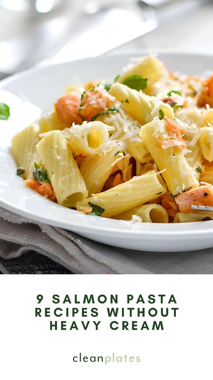 a white plate topped with pasta and shrimp