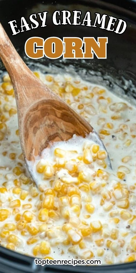 a wooden spoon stirring corn in a crock pot with the words easy creamed corn