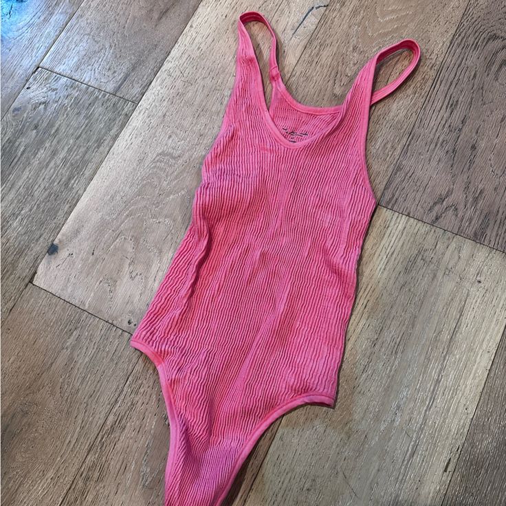 Size Xsmall/Small Vneck Bodysuit From Urban. Never Worn! Seamless V-neck Bodysuit For Poolside, Trendy V-neck Bodysuit For Loungewear, Casual V-neck Bodysuit For Spring, Spring V-neck Beachwear Bodysuit, Trendy V-neck Bodysuit For Vacation, Summer V-neck Seamless Bodysuit, Casual Pink V-neck Swimwear, Summer Seamless V-neck Bodysuit, Casual V-neck Bodysuit For Loungewear