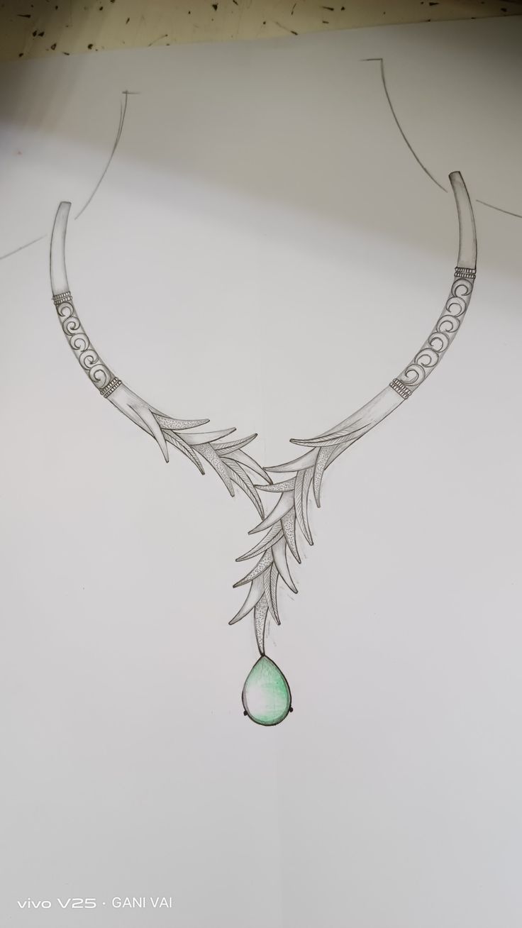 a drawing of a necklace with leaves and a tear hanging from it's side