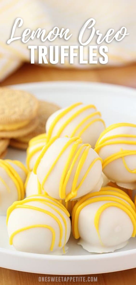 lemon oreo truffles on a white plate with cookies and crackers in the background