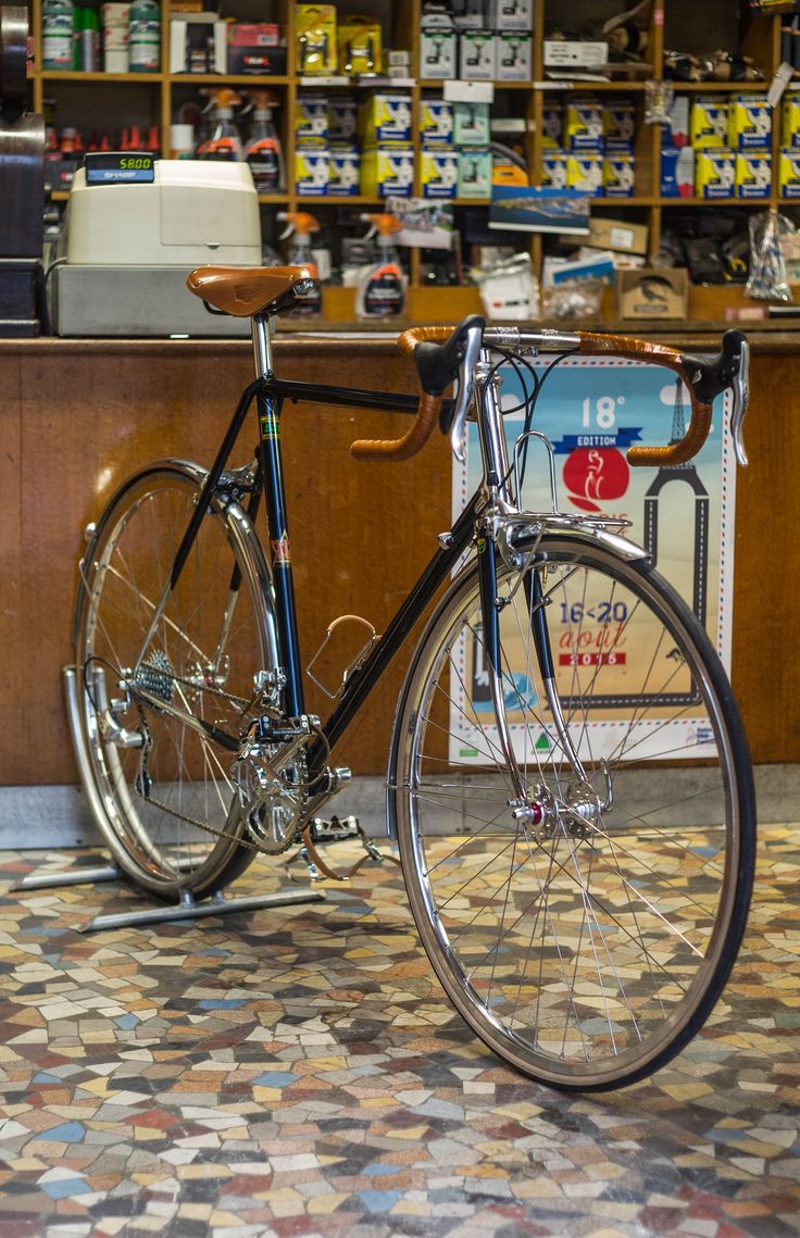 a bicycle parked in front of a store counter