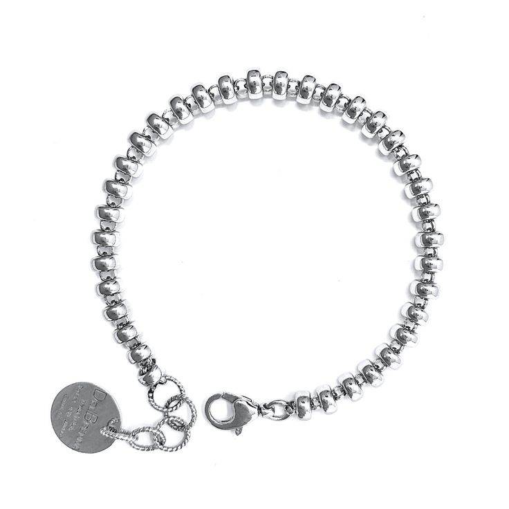 Ciambelle is Italian for donuts and this bracelet is simply delicious! The soft curves and bold design is positively elegant on its own and stacks marvelously. DelBrenna aficionados will recognize this style throughout our designs, making it an excellent piece to enhance your personal collection. Details: Made in Italy, Handmade Italian Jewelry Material: 925 Sterling Silver Finish: Rhodium over Silver Size: bracelet length 6 3/4" plus a 1 1/4" extension (17-20 cm) Details: swivel clasp; DelBrenn Everyday Round Charm Bracelet Jubilee Style, Everyday White Gold Oyster Bracelets, Elegant Everyday Metal Stretch Bracelet, Modern Silver Beaded Bracelets For Everyday, Modern Metal Beaded Bracelets For Everyday, Modern Metal Beaded Bracelets For Everyday Wear, Silver Jubilee Stretch Bracelet For Everyday, Modern Sterling Silver Beaded Bracelet For Everyday, Classic Sterling Silver Bracelets With Spacer Beads