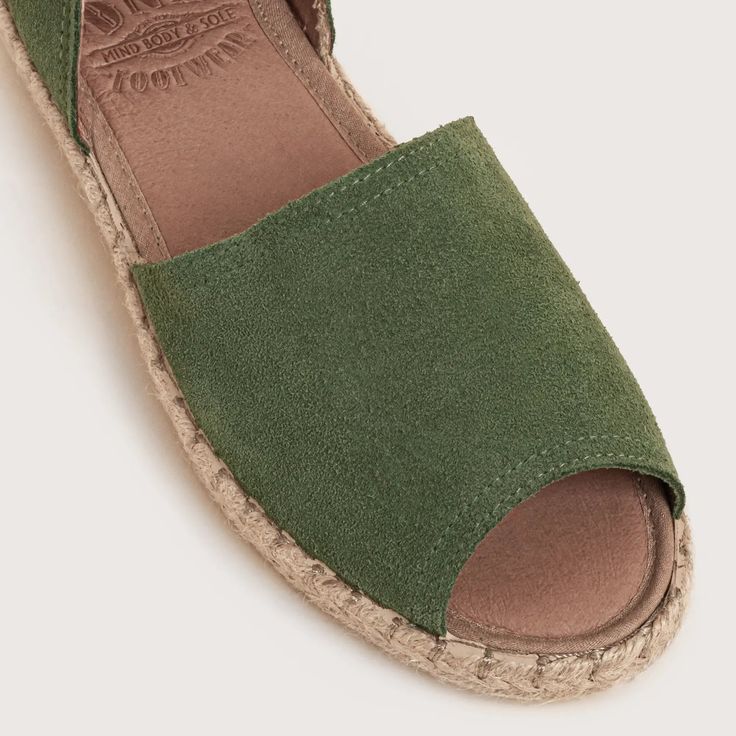 A Customer favorite, this authentic jute sole flat is an amazing addition to your wardrobe. Use this open-toe flat as a color pop or as the finishing touch to your spring dresses. The elastic insert in the heel ensures a perfect fit and the rubber sole keeps every step safe. Genuine suede uppers Open toe design Elastic inserts for a great fit Rubber soles for safety STYLENAME: CONEY-GRN Waterproof Slippers, Gift Card Sale, Water Shoes, Toe Designs, A Color, Kids Sneakers, Spring Dresses, Mens Shoes Sneakers, Wedge Shoes