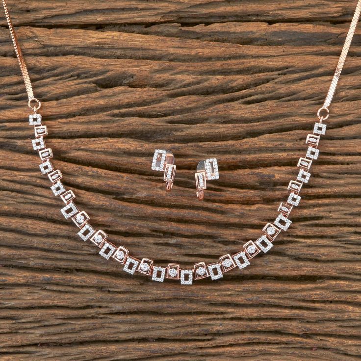 SIZE: Regular Size And Adjustable Delicate Design American Diamond Necklace Set This length works on practically anyone! Rose Gold Pendant Set, Rose Gold Necklace Simple, Rose Gold Jewelry Set, Delicate Diamond Necklace, American Diamond Necklace Set, Gold Pendant Set, Diamond Necklace Simple, Jewelry Necklace Simple, Unique Gold Jewelry Designs