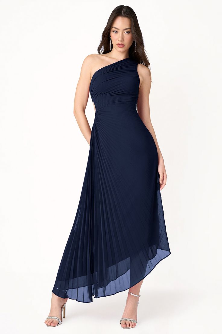 Our Angelina Asymmetrical Dress is the perfect day-to-night style. The sophisticated one-shoulder neckline paired with pleated details and A-line skirt will ensure you stand out at your next formal night out or wedding reception. Formal One-shoulder Evening Dress With Ruched Detail, Pre-draped Bridesmaid Dress With Asymmetrical Neckline, One-shoulder Fitted Pleated Evening Dress, Pre-draped One Shoulder Dress For Prom, Pre-draped One Shoulder Formal Dress With Ruched Detail, Formal Pre-draped One Shoulder Dress With Ruched Detail, Formal Pre-draped One Shoulder Dress With Ruching, Asymmetrical Ruched One Shoulder Gala Dress, Asymmetrical Ruched One-shoulder Gala Dress