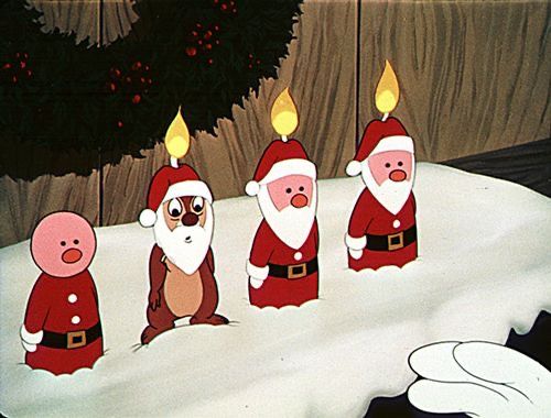 five cartoon santas with candles on their heads in front of a christmas tree and snow covered ground