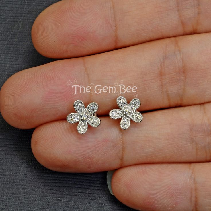 "Thank you for coming in! Extraordinary 14K solid white gold diamond flower Ear posts with backs! 0.15 carat total diamond weight,high quality F-G color, VS-SI clarity. It looks much much nicer in person! It is stamped with \"14k\" which is shown on the back. You'll get one pair per winning! SIZE: 8.6mm Weight: 1.45 gram (approx) MATERIAL: 14k Solid white gold, Diamond" Silver Cubic Zirconia Diamond Earrings In Delicate Style, Delicate Sterling Silver Diamond White Earrings, Delicate Diamond Earrings With Brilliant Cut, Diamond Flower Shaped Jewelry, Flower Shaped Diamond Earrings With Single Cut Diamonds, Delicate Silver Diamond Earrings For Anniversary, Delicate Diamond Earrings For Anniversary, Diamond White Flower Earrings For Anniversary, White Gold Flower Diamond Earrings With Prong Setting