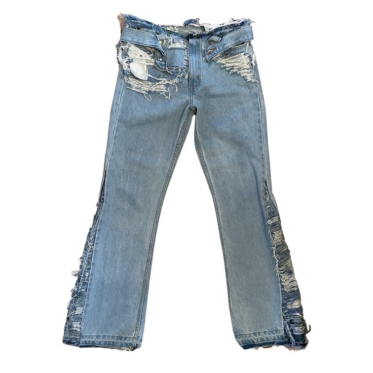 This Flared Distressed Denim is perfect for staying stylish and comfortable. It's made from curve-hugging distressed denim with a low waist and flared legs for a flattering and unique look. An ideal blend of fashion and comfort. Stretch Distressed Denim Blue Flare Jeans, Luxury Distressed Flare Jeans For Streetwear, Distressed Blue Recycled Denim Flare Jeans, Distressed Washed Blue Flare Jeans, Non-stretch Distressed Denim Flare Jeans, Reclaimed Vintage, Denim Flares, Vintage Fabrics, Distressed Denim