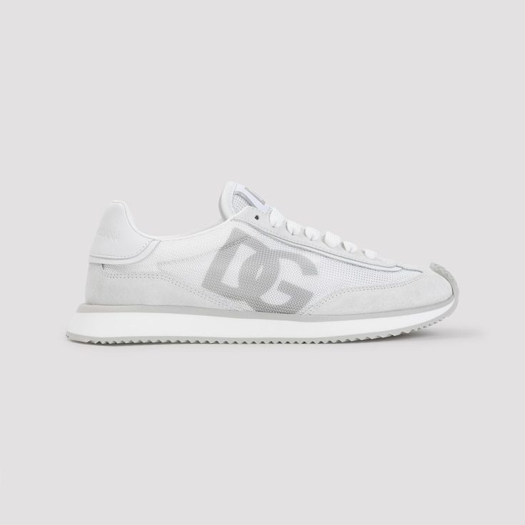 Check out these chic kicks. They effortlessly combine style and comfort in shades of white and grey, perfect for stepping up your sneaker game. Made in Italy, these are your new go-to for any casual outing. Lace-up closure for a secure fit Iconic DG logo on tongue and side Embossed Dolce & Gabbana logo at the back Durable rubber sole Crafted from 70% calfskin and 30% polyester Made in Italy Available in Italian sizing Minimalist Sneakers, Dolce Gabbana Sneakers, Sneakers Brown, Heels White, Dg Logo, Beige Heels, Cocoa Brown, Sneaker Games, Sneakers Grey