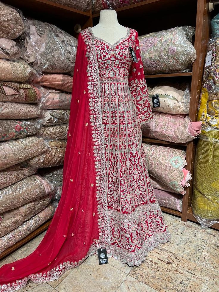 Rose red decorated with silver zari thread embroidery on the surface of the anarkali and highlighted in sequence and resham work. Paired with thread and sequence embroidered dupatta. Fabric: Georgette Size: 40/L Occasion: Wedding Events WASH CARE INSTRUCTIONS - Please Dry clean only when it is applicable. Slight color variation is possible due to photography Ready to Ship! Red Anarkali, Red 40, Anarkali Suit, Anarkali, Party Wear, Off Shoulder Dress, Red Roses, Color Variations, Full Length