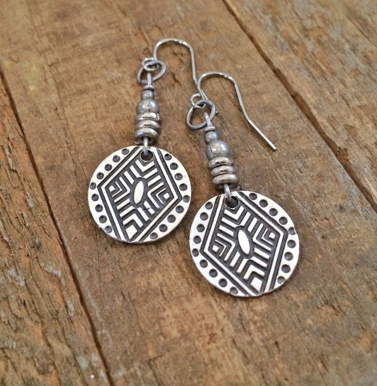 "Geometric, boho small silver dangle earrings with tribal etched pattern. Small, light weight boho, tribal inspired silver dangle earrings. Perfect for everyday wear and will add a little boho, southwestern vibe to your favorite outfit. Product overview: - Made with silver plated pewter drops and antiqued silver accents - Total hanging length of 1.75\" - Light weight and versatile, perfect for everyday wear - Hypoallergenic ear wiresPlease sign up for the Rustica Jewelry newsletter to receive sp Small Boho, Silver Dangle Earrings, Western Jewelry, Etsy Earrings Dangle, Earrings Boho, Geometric Earrings, Silver Earrings Dangle, Silver Accents, Gorgeous Necklaces