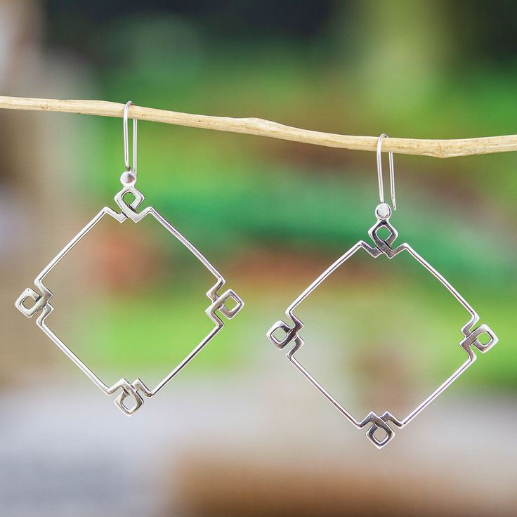 Geometry has never been so stylish and unique. Guillermo Arregui from Mexico creates this gorgeous pair of dangle earrings from sterling silver, adding a polished finish that enriches the design's modern aura, which makes it perfect for any occasion. Simple Handmade Earrings, Wire Wrapped Crystal Earrings, Elegant Silver Geometric Earrings, Elegant Geometric Sterling Silver Jewelry, Elegant Sterling Silver Geometric Jewelry, Elegant Geometric Silver Jewelry, Elegant Silver Geometric Jewelry, Modern Geometric Sterling Silver Earrings, Modern Sterling Silver Nickel-free Linear Earrings