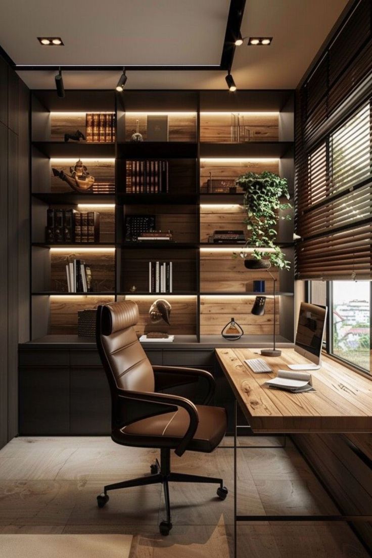 an office with a desk, chair and bookshelf in the middle of it