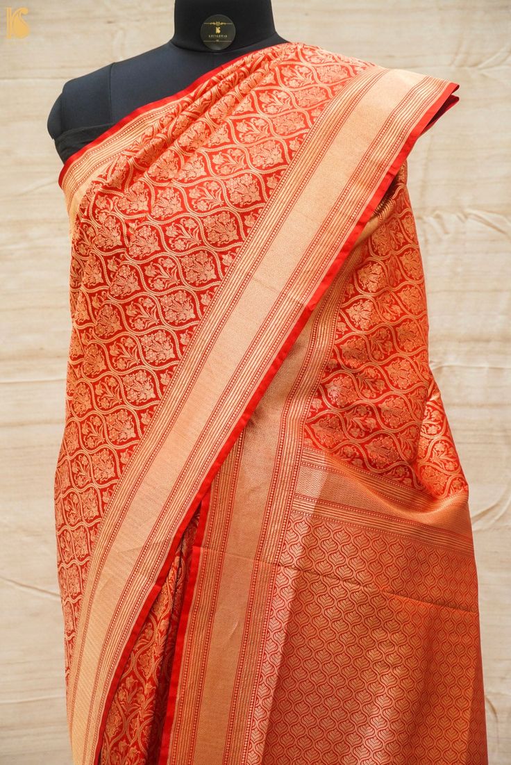 Experience the luxurious elegance of our Katan Silk Tanchoi Sarees, handcrafted with intricate Banarasi designs and premium Katan silk fabric. Available in a range of colors and styles, these sarees are the perfect choice for any special occasion Traditional Orange Banarasi Silk Pre-draped Saree, Tussar Silk Pre-draped Saree With Zari Weaving For Puja, Silk Pre-draped Saree With Zari Weaving For Puja, Orange Tussar Silk Saree With Zari Weaving, Festive Orange Raw Silk Saree, Elegant Orange Art Silk Traditional Wear, Orange Banarasi Silk Handloom Saree, Orange Semi-stitched Banarasi Silk Pre-draped Saree, Orange Raw Silk Saree With Traditional Drape