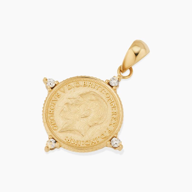 Our Legacy Coin Pendant Charm is the perfect bridge of history and style. Celebrating legacy, it depicts King George V, celebrated for his leadership during a pivotal era. The coin's vintage allure is enhanced by modern design elements, making it a versatile addition to any jewelry collection. Luxury 14k Gold Jewelry For Commemoration, Yellow Gold Jewelry With Historical Design For Formal Events, Formal Yellow Gold Jewelry With Historical Design, Classic 14k Gold Jewelry With Historical Design, Vintage Yellow Gold Jewelry With Historical Design, Classic Polished Jewelry For Commemoration, Classic Gold Jewelry With Historical Design, Yellow Gold Jewelry With Historical Design For Anniversary, Classic White Gold Jewelry For Commemoration