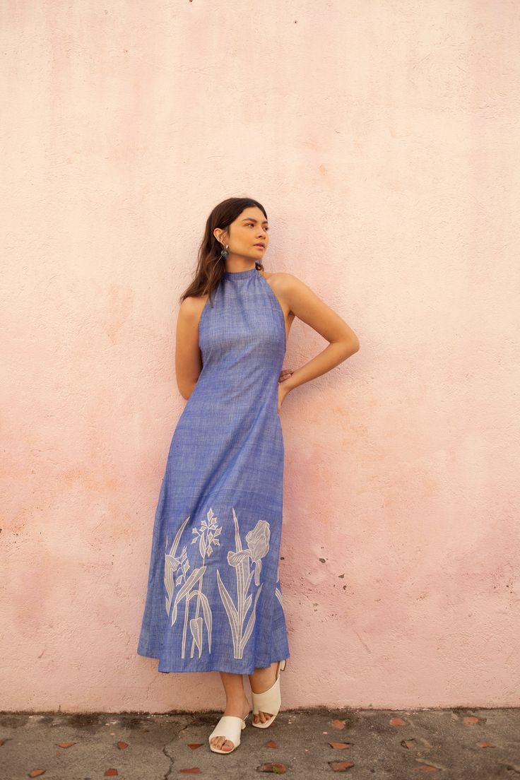 De Castro showcases a seamless and unique blend of traditional Indian craftsmanship, contemporary design, and the founder’s Colombian heritage. Every piece is handmade by artisans, using time-honored techniques and the finest cotton and silk fibers, resulting in exceptional quality, sustainability, and style. The Aqua Dress is crafted from sumptuous raw khadi silk, handwoven in the south of India. It features a halter neck back tie closure, midi hemline, relaxed fit, and patch organza embroidery. Product Details 100% Khadi silk. Embroidery: 100% organza. Made in India. Care Instructions Dry-clean only. Size & Fit This item fits true to size. Shipping Details This item is made-to-order. Please allow 3-4 weeks for production and 5-7 business days for standard delivery. Return Policy This ite Organza Embroidery, Simple Kurta Designs, Handloom Fabric, Casual Indian Fashion, Patch Embroidery, Kurti Designs Party Wear, Designer Dresses Casual, Quick Outfits, Aqua Dress