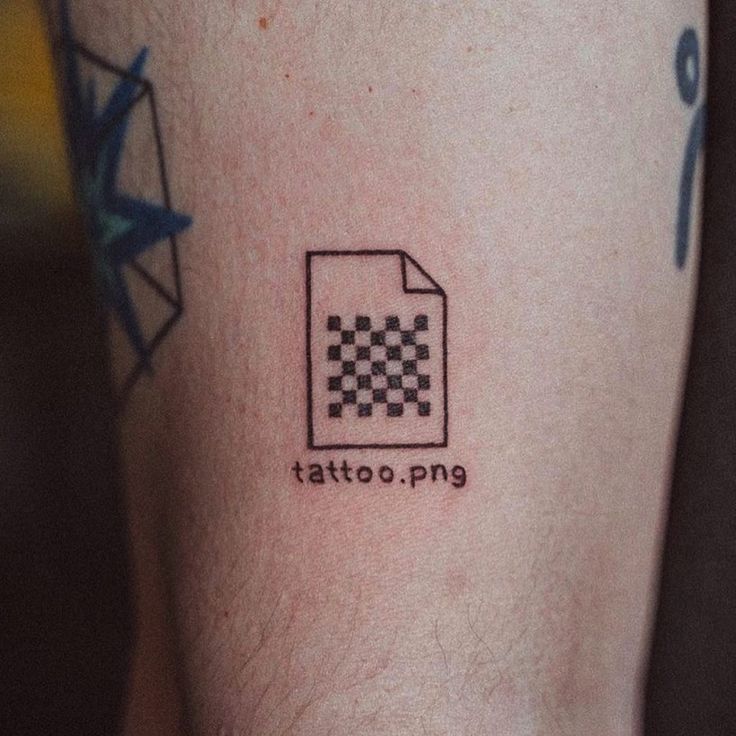 a tattoo with a checkerboard pattern on it