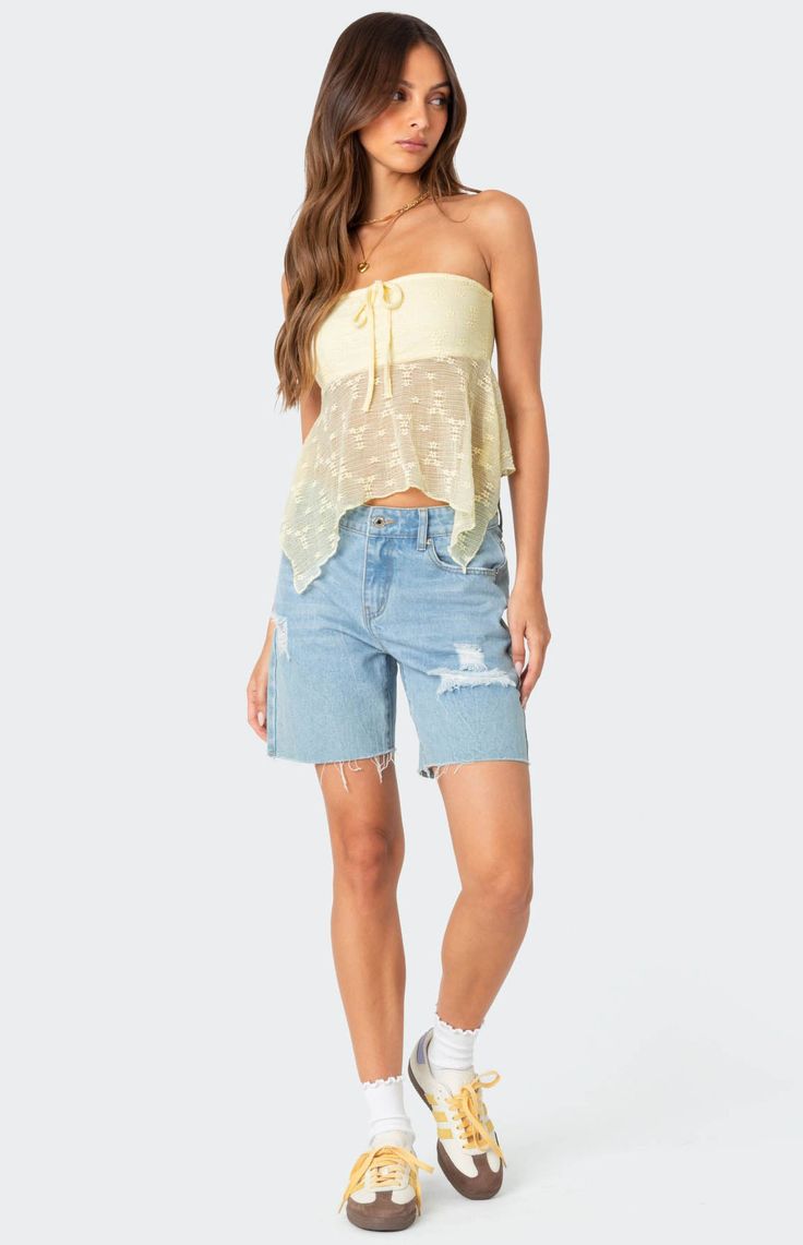 Online only! Whether you want to wear this top on its own for your next beach vacation, or throw it over your favorite swimsuit, the Edikted Embroidered Sheer Strapless Top is the perfect fit to give you vacation vibes all summer. 


	Top
	Asymmetric hem
	Strapless fit
	Lined bust
	Front tie detail
	Sheer embroidered fabric
	Polyester, Spandex
	Model wears size S
	Model height is 5'9
	Item care: Wash with similar color Visionary Fashion, Vacation Vibes, Embroidered Fabric, S Models, Asymmetric Hem, Model Height, Pacsun, Beach Vacation, Polyester Spandex