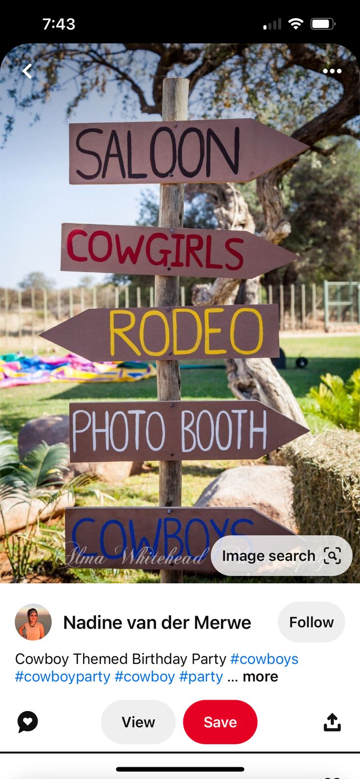 an image of a sign post with many different signs on it