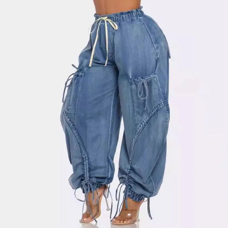 Non-stretch pants High-waisted Elastic waistband Pockets Cuffed ankles Oversized Inseam is 27 inches 75% Cotton 25% Polyester Hand wash cold Model is wearing a small Elastic Waist Jeans, Denim Cargo Pants, Denim Cargo, Trendy Streetwear, Jeans Cargo, Oversized Silhouette, Cargo Jeans, Urban Chic, Haiti