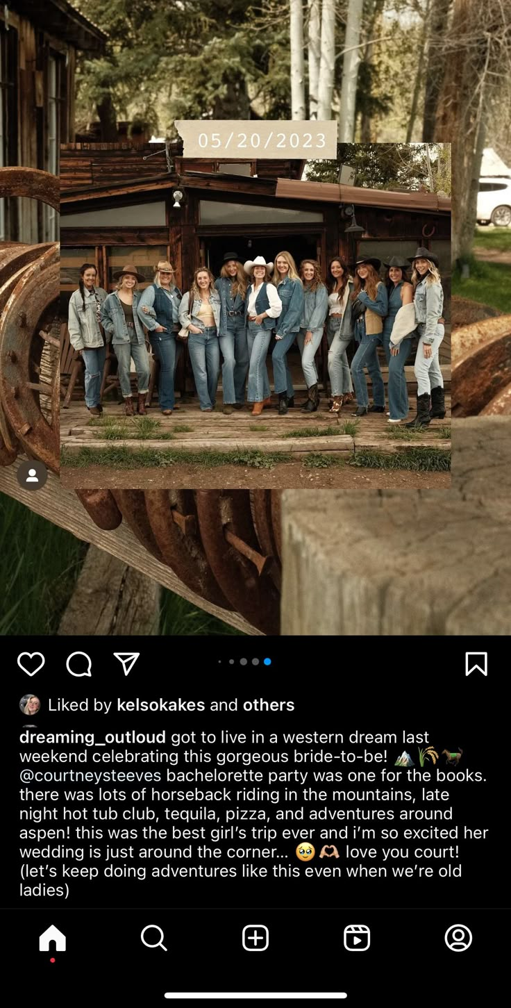 a group of people standing on top of a wooden structure in front of some trees