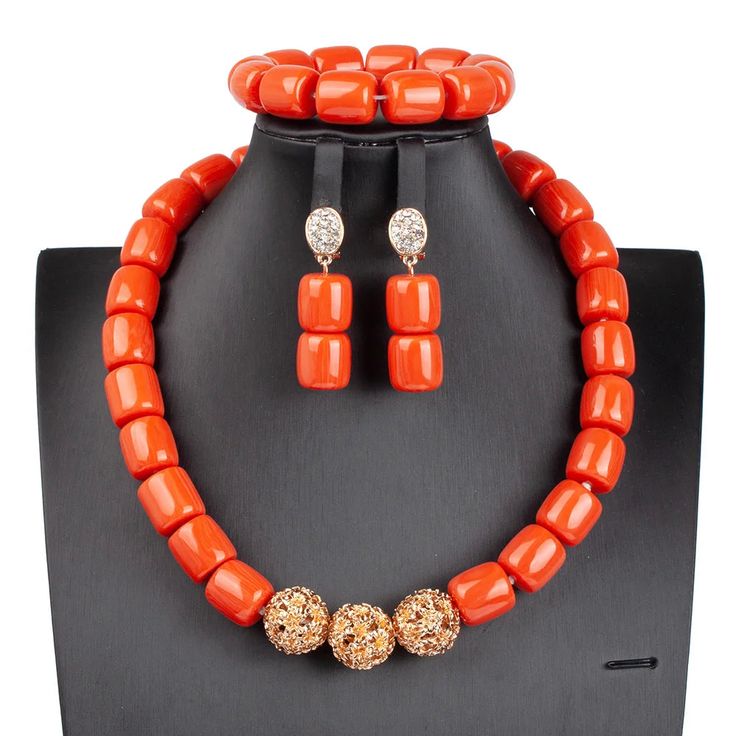 African Beaded Jewelry Set is a style inspiration. Indulge in the epitome of elegance with our Classy Women’s Jewelry Set. This set is a vibrant celebration of African culture, featuring beautifully handcrafted pieces that are sure to turn heads and elevate your style. Designed for the fashionable woman, this set includes a stylish necklace, trendy beaded bracelet, and chic beaded earrings, all coordinated to offer a seamless look. Exquisite Craftsmanship Each piece in this set is crafted with high-quality zinc alloy and resin, ensuring durability while maintaining a lightweight feel. The trendy beads are arranged in a captivating plant pattern, embodying both the beauty of nature and the pinnacle of fashion. Available in six stunning colors, this jewelry set offers versatility and style. Elegant Red Beaded Jewelry Set, Elegant Handmade Beads For Festivals, Handmade Elegant Beads For Festivals, Elegant Orange Beaded Necklaces For Party, Elegant Orange Beaded Necklace For Party, Elegant Formal Gold Beads, Orange Round Beads Jewelry For Party, Elegant Polished Beads For Festive Occasions, Elegant Red Beads For Festivals