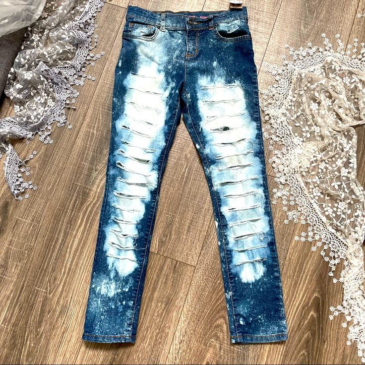 The Childrens Place Blue Denim Slight Stretch Jeans Acid Washed And Distressed By Small Shop Boutique. High Rise Bleached Blue Jeans, Blue Bleached Denim Bottoms, Bleached Blue Denim Jeans, Blue Bleached Denim Jeans, Light Blue Ripped Cotton Jeans, Light Blue Distressed Fitted Jeans, Trendy Bleached Blue Jeans, Light Blue Distressed Cotton Jeans, Bleached Blue Jeans For Summer