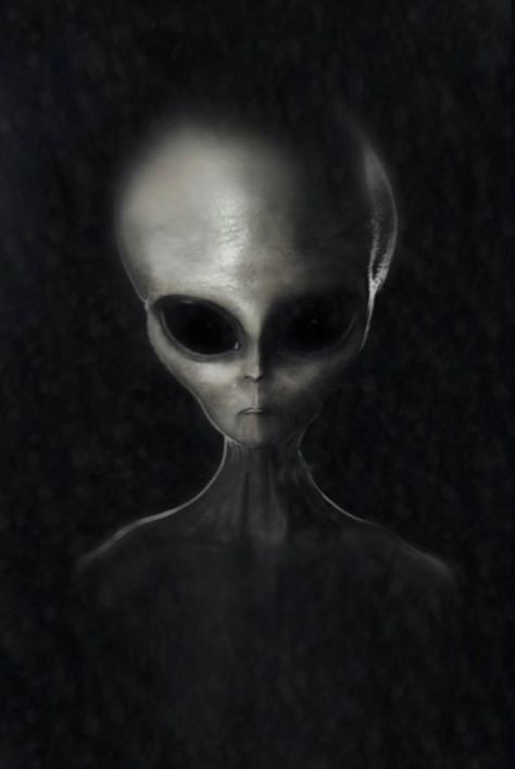 an alien is standing in the dark with its head turned to look like it's looking