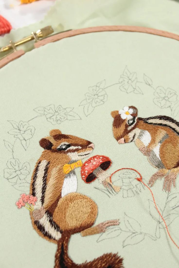 a close up of a small embroidered animal