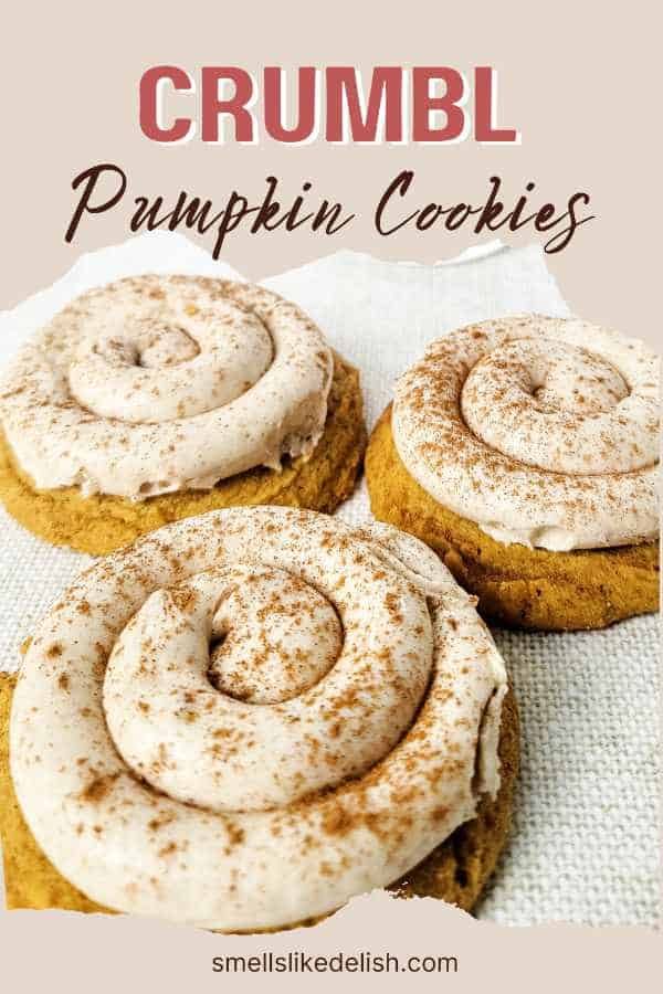 three pumpkin cookies with frosting on top and the words crumbl pumpkin cookies above them