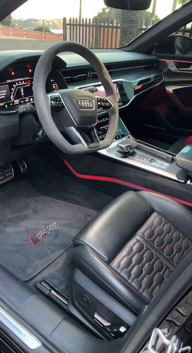 the interior of an audi car is clean and ready to be driven