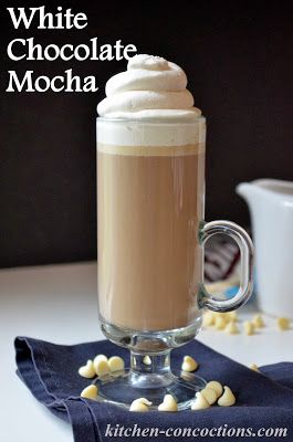 white chocolate mocha in a glass mug with marshmallows