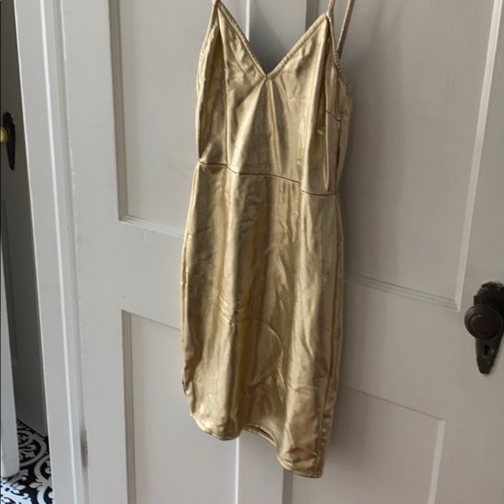 Gold Lam’e Gold V-neck Slip Dress For Spring, Chic Gold Midi Dress For Spring, Spring Fitted Gold Midi Dress, Gold Bodycon Dress For Spring Night Out, Gold Dress For Going Out, Dressy Gold Summer Dress, Gold Dressy Summer Dress, Gold Dress For Night Out In Spring, Spring Gold Midi Dress For Brunch