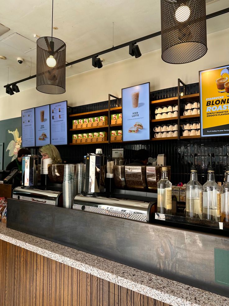 there is a coffee shop with many items on the counter