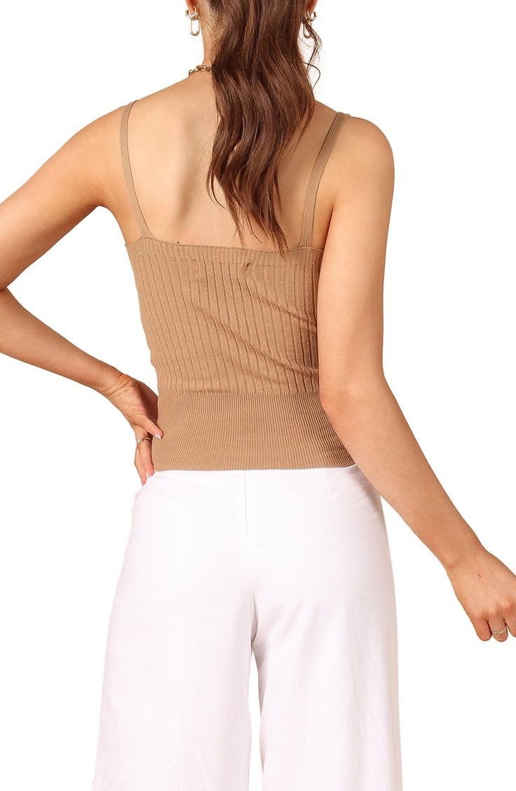 Effortlessly chic whether layered or solo, this V-neck tank is knit in a slinky rib stitch in a fitted silhouette. V-neck 45% polyester, 32% viscose, 23% nylon Hand wash, dry flat Imported Beige Ribbed V-neck Top, Summer V-neck Crop Top For Layering, Spring Seamless Tops For Layering, Chic Beige Ribbed Tank Top, Spring Ribbed Camisole Top, Ribbed Camisole Tops For Spring, Fitted Spaghetti Strap Tops For Fall, Ribbed Tank Top For Day Out, Fitted Tops With Spaghetti Straps For Fall