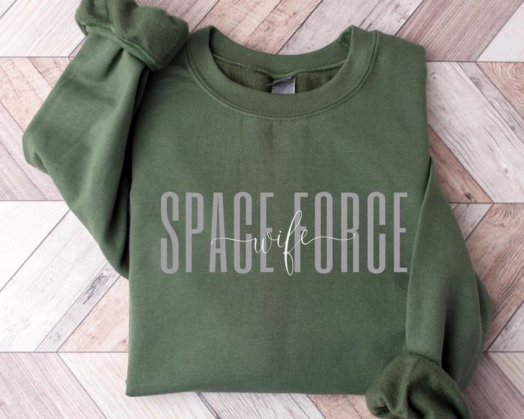 Space Force wife sweatshirt/crewneck! This will be perfect for engagement gift/Deployment Gifts/graduation gift, etc... Ideal for any situation, a unisex heavy blend crewneck sweatshirt is pure comfort. These garments are made from polyester and cotton. This combination helps designs come out looking fresh and beautiful. The collar is ribbed knit, so it retains its shape even after washing. There are no itchy side seams on these sweaters.  .: 50% cotton, 50% polyester .: Medium-heavy fabric (8.0 Wife Sweatshirt, Custom Crewneck Sweatshirts, Deployment Gifts, Space Force, Text Shirt, Special Gifts For Her, Matching Sweaters, Alabama Football, Sweatshirt Crewneck