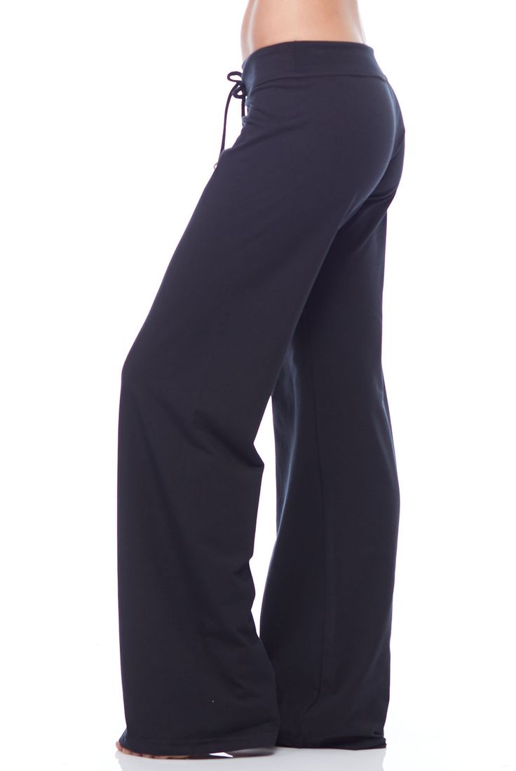 Please Note: This item is MADE TO ORDER and ships in 7-10 days.  Please note: This item is EXCHANGE ONLY for any SANDRA MCCRAY ITEM.    Wide straight-leg drawstring pant with quality copper rivets. Made from Sandra McCray "flat" fabric that is soft and smooth to the touch. Relaxed fit, extremely comfortable and is great for any activity.  Why we love: Quality fabric- will not stretch out or lose it's shape.Fabric: 42% poly, 42% cotton, 16% lycraCare:  Washer and dryer safe. Preshrunk. Yoga Pants With Drawstring, Solid Color Drawstring Yoga Pants, Solid Color Yoga Pants With Drawstring, Athleisure Full-length Pants With Drawstring, Stretch Full Length Wide Leg Pants With Drawstring, Stretch Full-length Wide Leg Pants With Drawstring, Yoga Bottoms With Drawstring, Stretch Straight Leg Bottoms With Drawstring, Stretch Straight Leg Pants With Drawstring