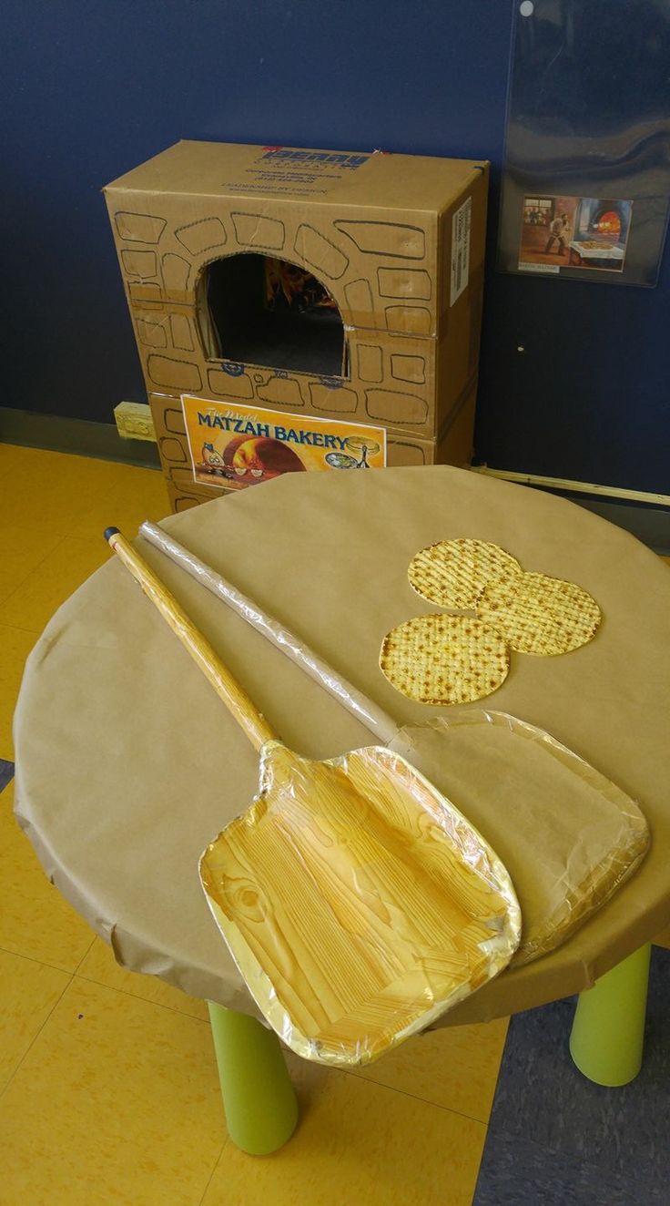 a child's play table made out of cardboard