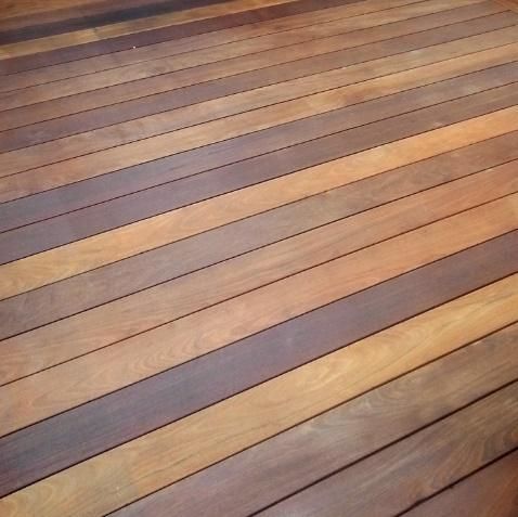 a close up of a wooden deck with no one on it