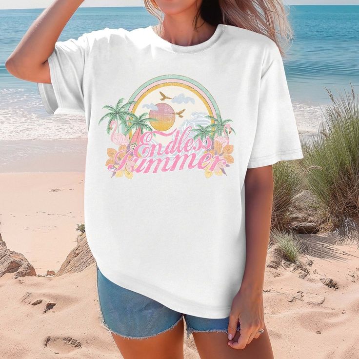 Embrace the sunny spirit and laid-back charm of the warmest months with our Endless Summer Comfort Color Tee. Perfect for those who thrive on beachside adventures and outdoor escapades, this shirt is your ticket to endless sunshine and fun. With its premium Comfort Color fabric, this shirt promises exceptional softness and long-lasting quality. Whether you're lounging on golden sands or hiking along scenic coastal paths, you'll stay effortlessly comfortable. The timeless "Endless Summer" motif e Summer Cotton T-shirt For Beach Party, Relaxed Fit Summer T-shirt For Beach Party, Beachwear T-shirt With Graphic Print For Summer Adventures, Cotton T-shirt For Beach Party In Spring, Summer Beachwear T-shirt With Relaxed Fit, Graphic Print T-shirt For Summer Beach Party, Relaxed Fit Summer Beachwear T-shirt, Relaxed Fit Beachwear T-shirt For Summer, Cotton T-shirt For Spring Beach Party