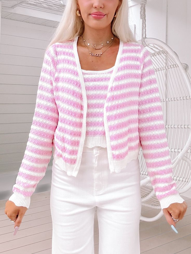 Meet the Simone Sweater Set from Sassy Shortcake! This pink and ivory striped knit ensemble includes a tank and cardigan with a playful scallop hem. Stay warm, stylish, and effortlessly put-together all at once! fits true to size, model wearing a size small content: 72% viscose 28% polyester care: hand wash cold Sassy Shortcake, Young Adult Fashion, Patriotic Dresses, Scallop Hem, Shoe Gifts, Scalloped Hem, Sweater Set, Striped Knit, Pink Sweater