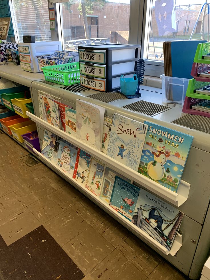 there are many children's books on display in the store