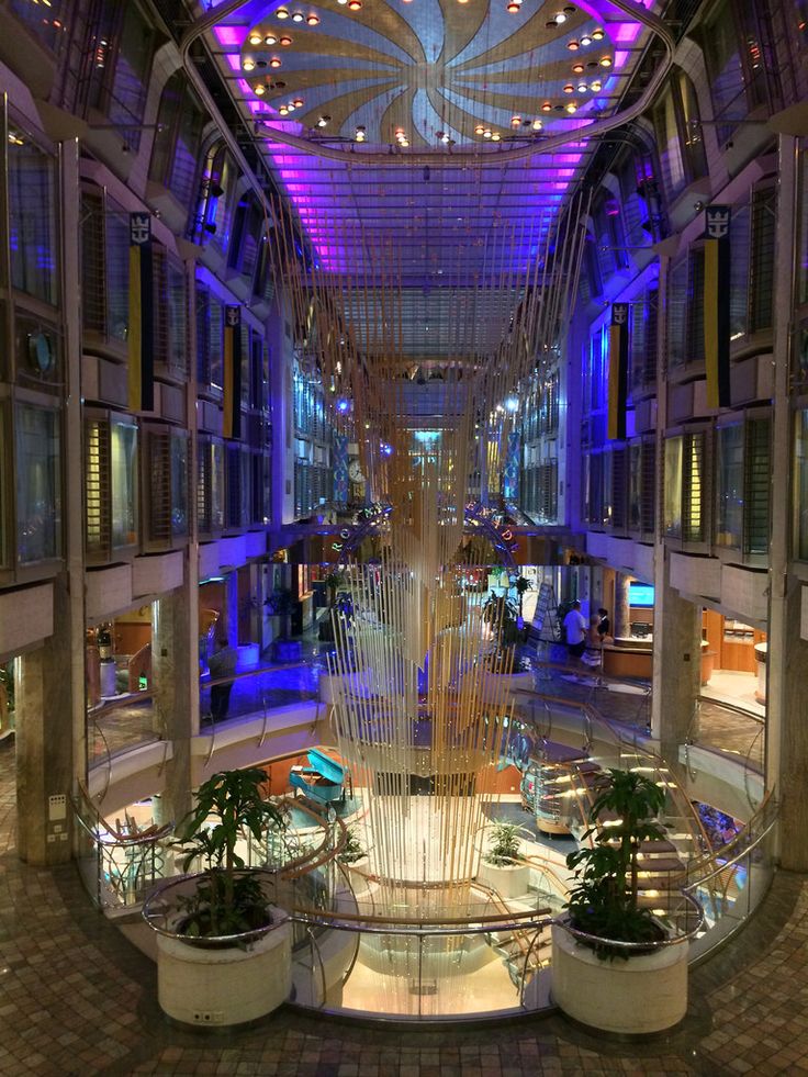 the inside of a building with a fountain in it