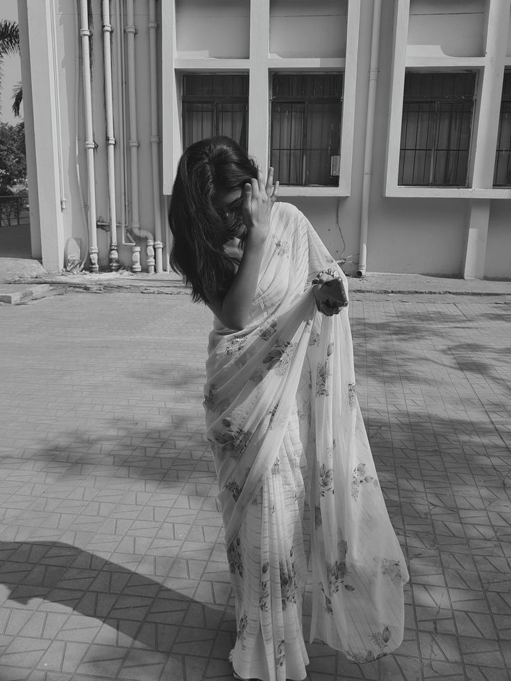 black and white photograph of woman in sari