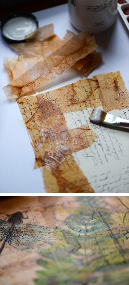 an image of some old papers on a table with a pair of scissors next to it