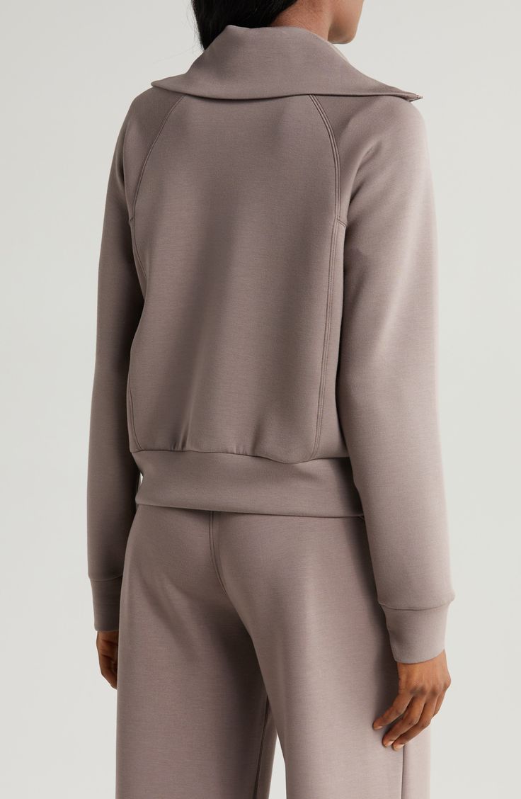 A modal-enhanced blend adds comfort to a half-zip sweatshirt styled with a stand collar and slightly split cuffs. 21 1/2" length (size Medium) Stand collar Long sleeves 47% modal, 46% polyester, 7% elastane Dry clean or machine wash, tumble dry Imported Fall Half-zip Loungewear Activewear, Versatile Half-zip Sweatshirt With Ribbed Cuffs, Athleisure Half-zip Sweatshirt For Loungewear, Stretch Long Sleeve Track Jacket For Loungewear, Relaxed Fit Long Sleeve Track Jacket For Loungewear, Half-zip Athleisure Sweatshirt, Fall Athleisure Track Jacket For Loungewear, Solid Half-zip Outerwear For Loungewear, Solid Half-zip Sweatshirt In Athleisure Style