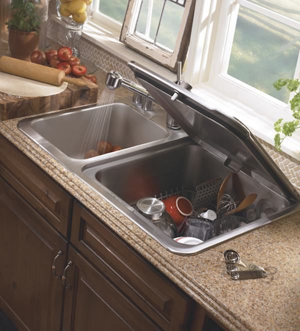 a kitchen sink filled with lots of clutter and cooking utensils next to a window