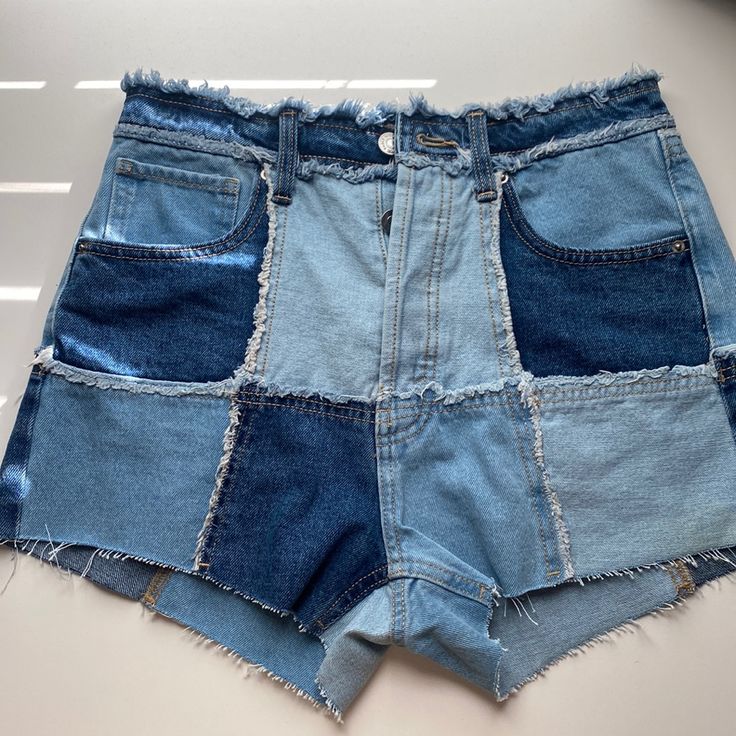 Never Worn New Condition Trendy Medium Wash Patchwork Bottoms, Denim Blue Patchwork Shorts, Short Spring Bottoms With Patchwork, Short Denim Blue Patchwork Bottoms, High Rise Patchwork Bottoms In Medium Wash, High Waist Patchwork Shorts For Summer, Summer High Waist Patchwork Shorts, High Rise Medium Wash Patchwork Bottoms, Medium Wash High Rise Patchwork Bottoms